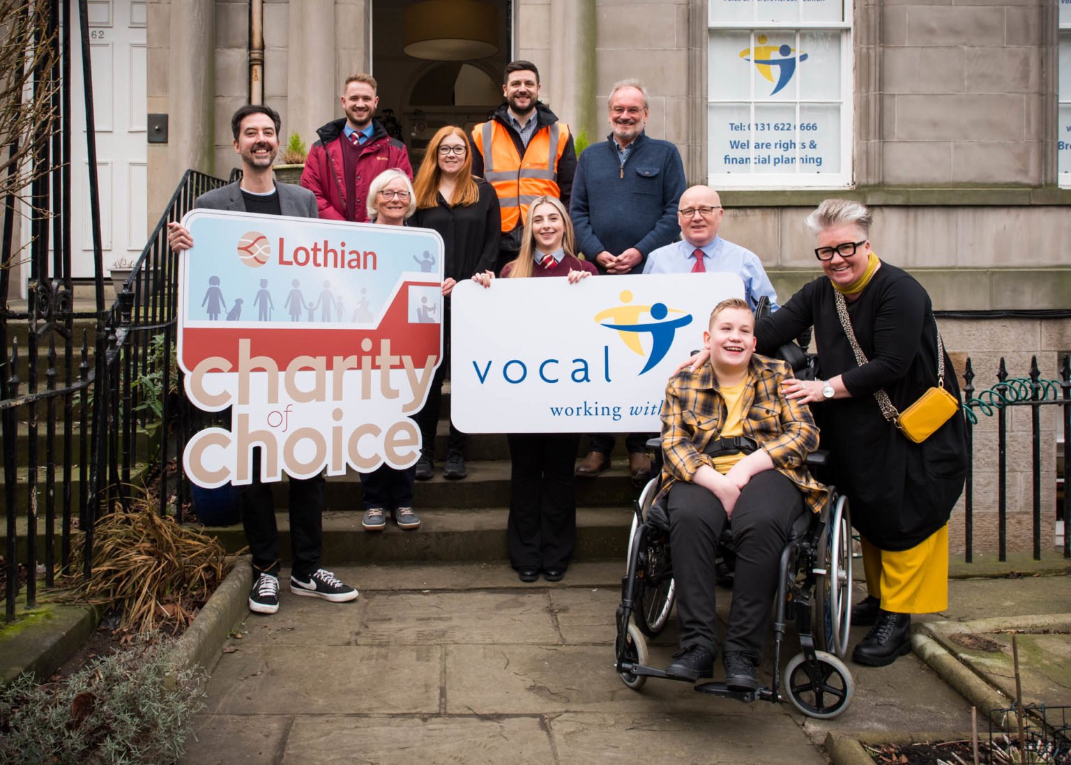vocal employees showcasing charity choice banner